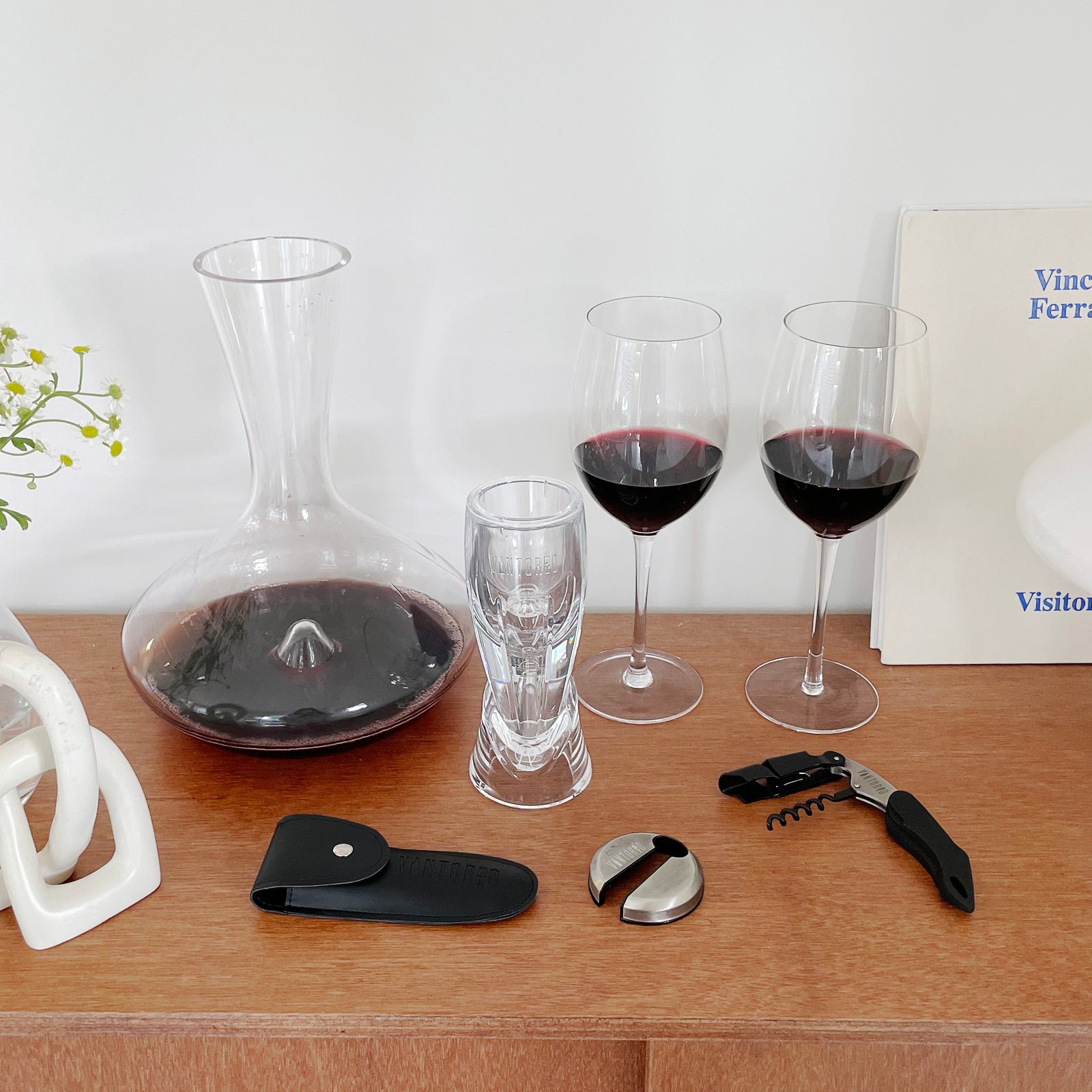 Vintorio Citadel Crystal Wine Decanter, Omni Aerator, Waiter's Corkscrew, Metal Foil Cutter, and GoodGlassware Wine Glasses on a shelf